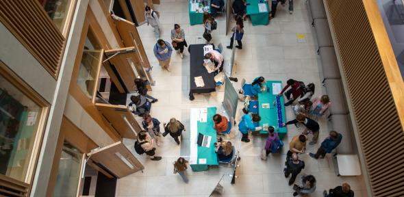 Open Days in the atrium Students and staff at a busy recruitment event